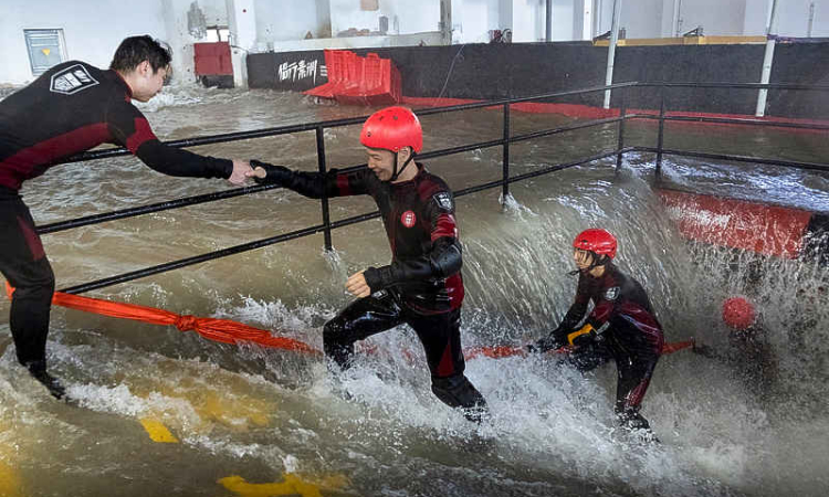 In China, people brave simulated  typhoons to prepare for real thing